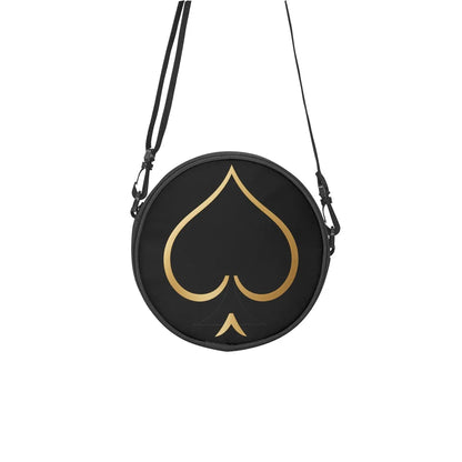 Detailaufnahme des gold-schwarzen Pik-Designs auf der Queen-of-Spades-Tasche schwarz